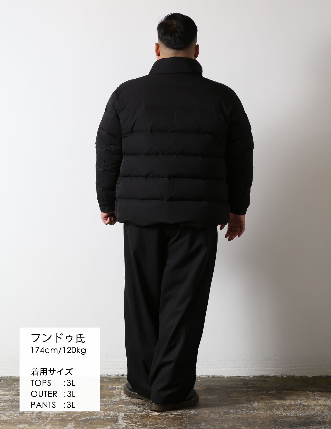 黒を重ねて、すっきり着こなす04